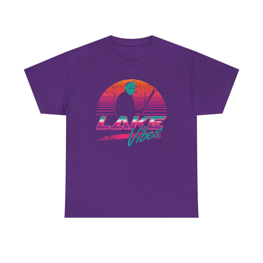 A purple t-shirt with an orange sunset and Jason Vorhees in front of it and the words "Lake Vibes" underneath in a retro 80s style by Glow Bat Alternative Fashion