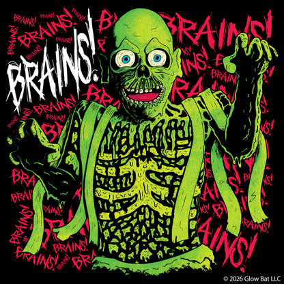 An original illustration of the Tarman Zombie from Return of the Living Dead in green with the word "Brains" scrawled behind it in pink by Glow Bat Alternative Fashion.