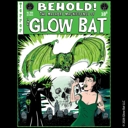 An original green, white, and black illustration by Glow Bat Alternative Fashion of a dark figure summoning a large green bat towards an attractive dark-haired woman in a green dress. They are in a cemetery with a full moon with a skull in it. It is designed to look like an old horror comic like Tales From the Crypt.