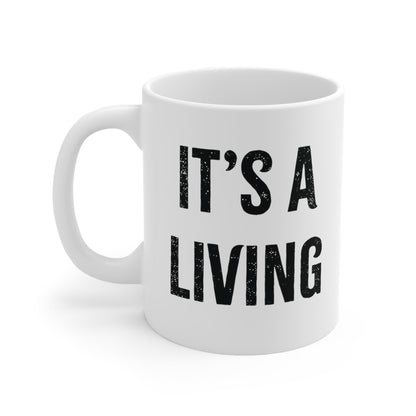 The right side view of a white alternative fashion coffee mug with text that reads "it's a living."